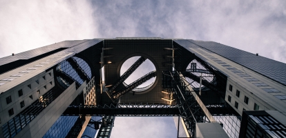 Looking directly up at Umeda Sky Building in Osaka