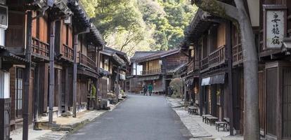 Wooden buildings lining street in Tsumago, Japan 