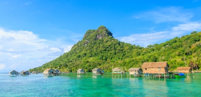 Wooden huts on stilts on Mabul Bodgaya Island, Malaysia