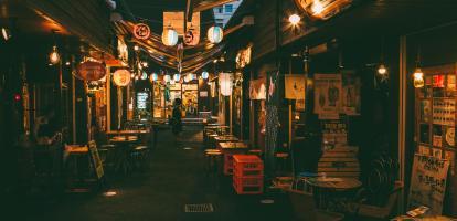 Japanese food stalls and outdoor seating at night