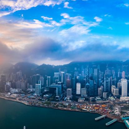 Aerial view of Hong Kong Island with sunlight beaming through