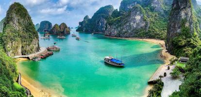 Beautiful azure waters in Ha Long Bay, Vietnam, with cruises in the bay