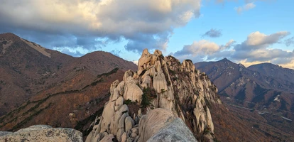 Morning light bathes the summit of one of the peaks in the hiking-friendly Seoraksan National Park in South Korea