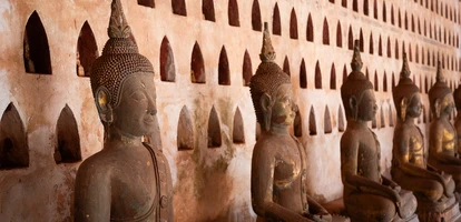 Buddha statues lined up next to each other in Wat Si Saket, Laos
