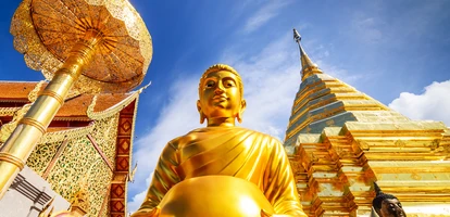 Golden statue and temple in Wat Prha That Doi Suthep in Northern Thailand