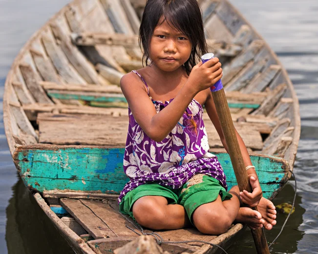 Girl on boat in Tonle Sap lake