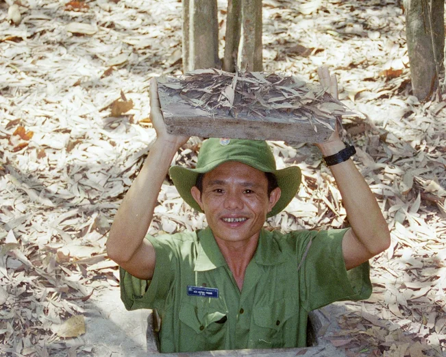 Person in Cu Chi Tunnels 