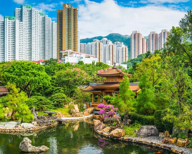 Ornate gardens with skyscrapers in the background 