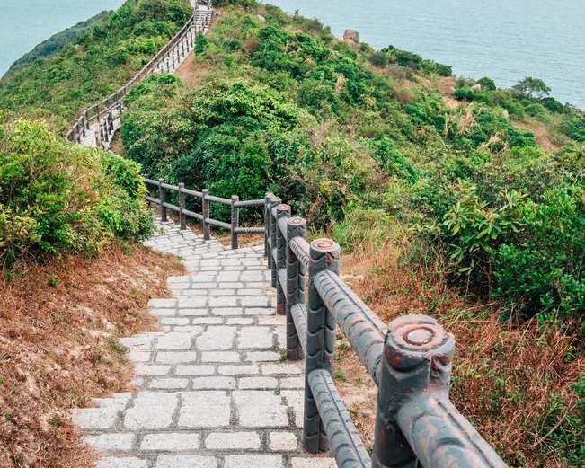 Coastal path with wooden fence in Cheung Chau