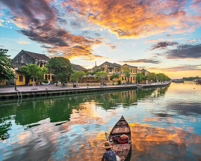 Boat on water in Hoi An at sunset