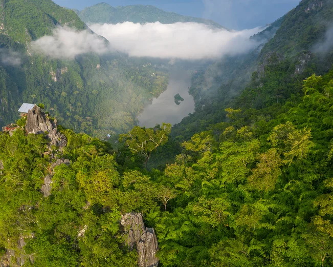 Aerial view of the dramatic forest-covered karst rock formations near Nong Khiaw in northern Laos