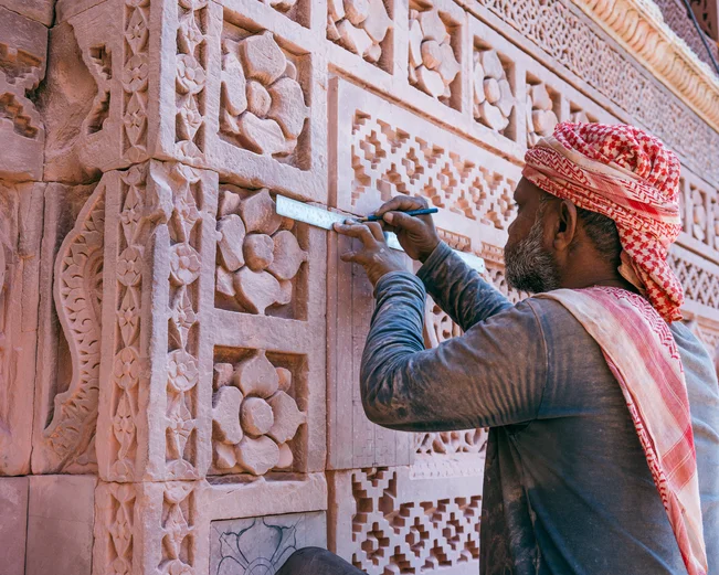 Man doing ornate construction in Delhi