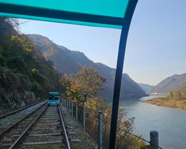 A view from the rail bike over the water and mountains in Chuncheon South Korea
