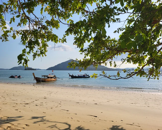 Thailand coastline with longtail boat