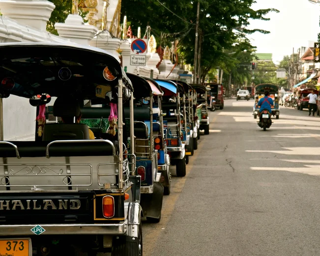 Chiang Mai road with tuk tuks