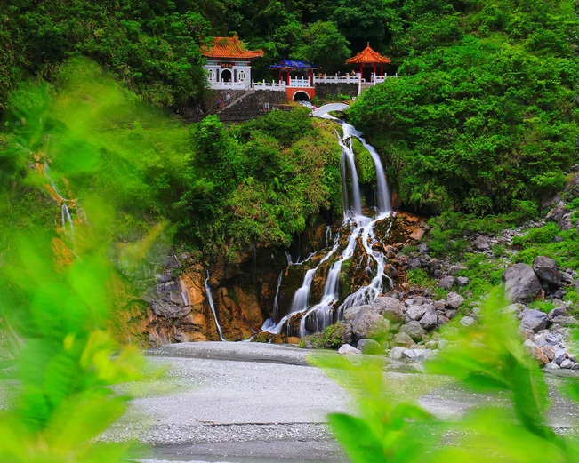Buildings and a waterfall in Taroko Gorge