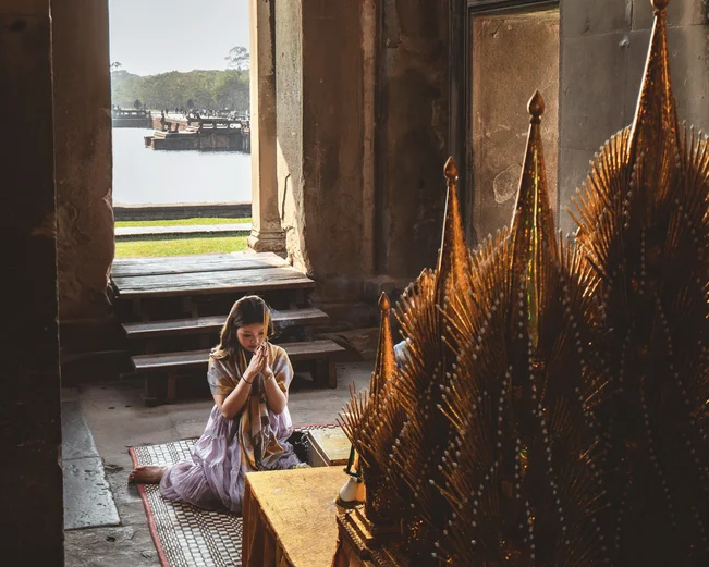 Praying at temple in Angkor