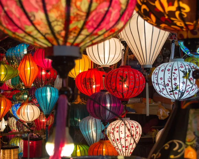 A close up of colourful silk lanterns