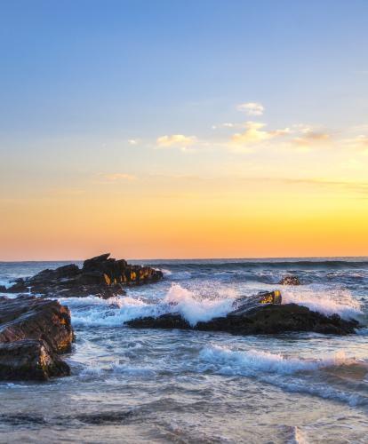 Waves crashing over rocks at Gangneung