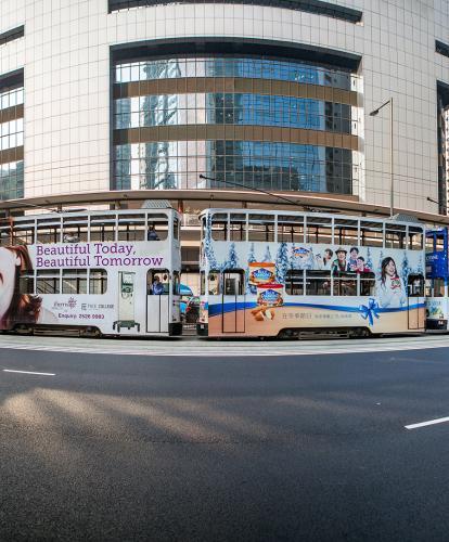 Trams on main road in downtown Hong Kong