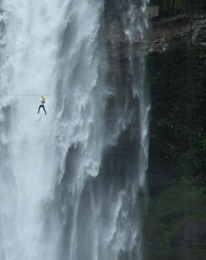 Ziplining over waterfall