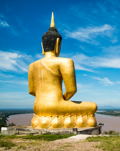 Golden Buddha overlooking Mekong near Pakse