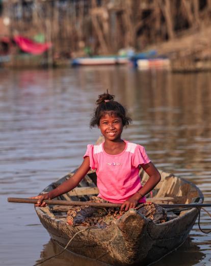 Local girl in boat on lake