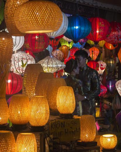 Romantic couple with Hoi An lanterns