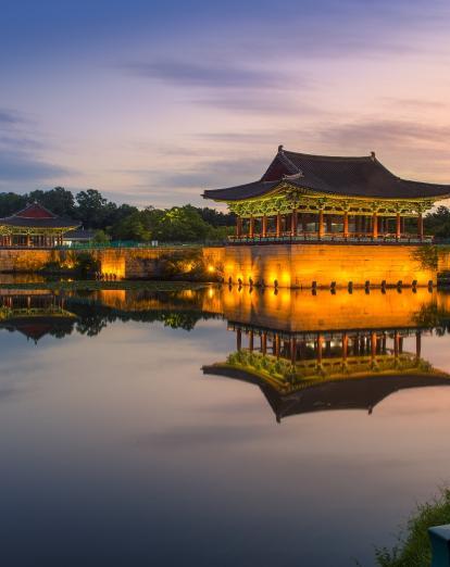 Anapji Pond and Observatory illuminated at night.