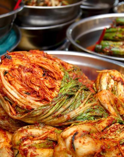 Spicy Korean cabbage in a stainless steel bowl