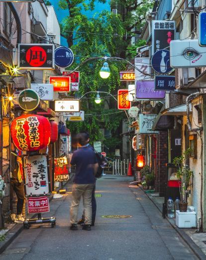 People outside bars in Tokyo's Golden Gai district