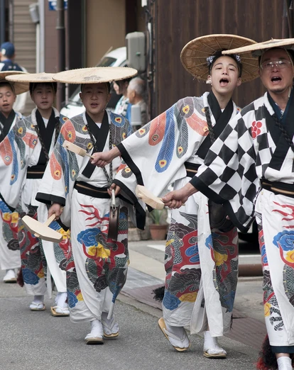 Parade of people in traditional dress in Takayama 