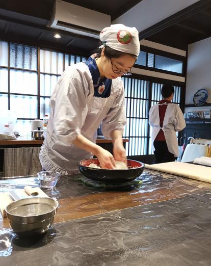 Chef preparing food at Kanazawa cookery class