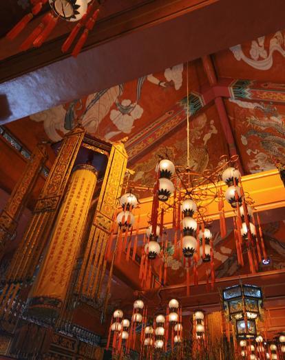 Lanterns inside red room in monastery