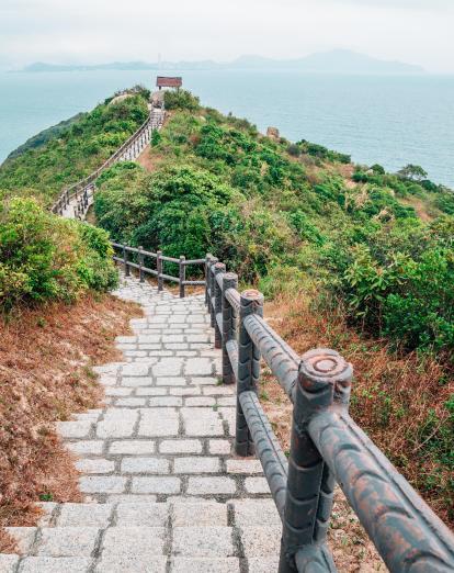 Coastal path with wooden fence in Cheung Chau