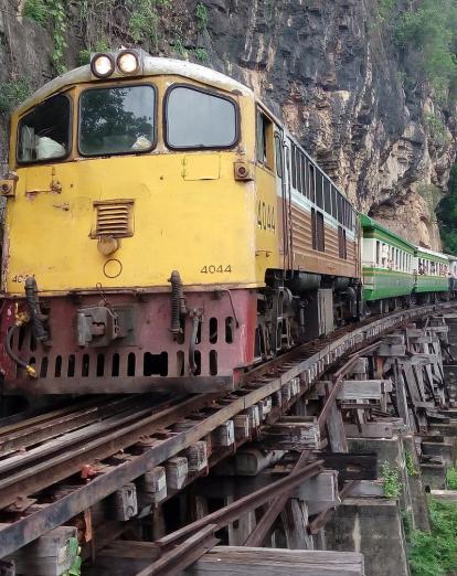 Train on tracks along cliffside