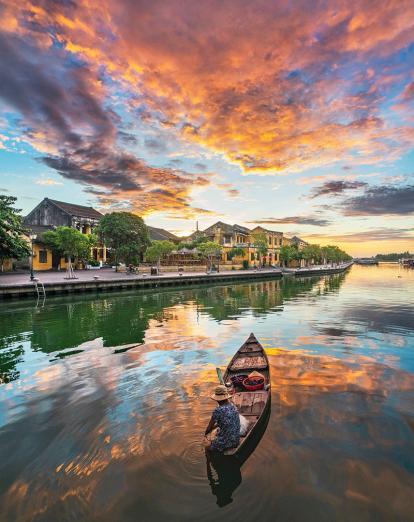Boat on water in Hoi An at sunset