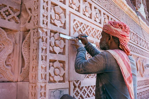 Man doing ornate construction in Delhi