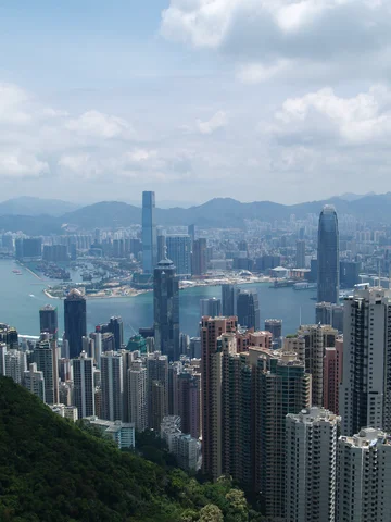 City skyline view of Hong Kong with hills in the background