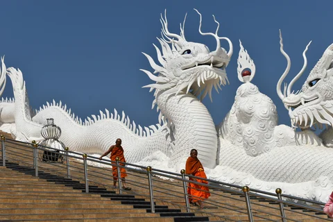 White temple with monks