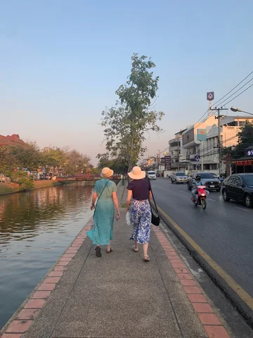 2 people walking in Chiang Mai