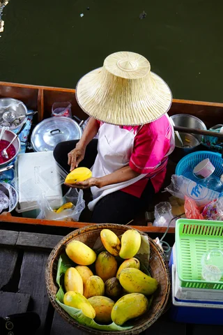 Mango seller on a boat