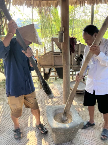 Husking rice in Hoi An