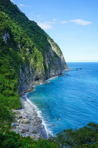A rocky coastline and blue water