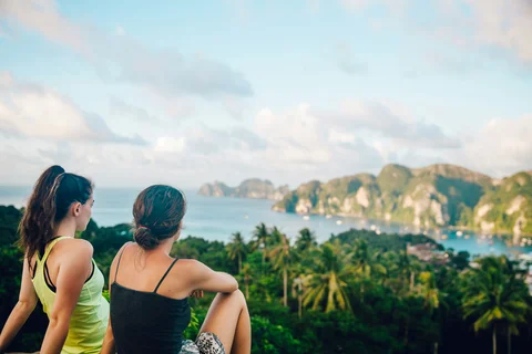 Two women looking out over the viewpoint of Ko Phi Phi