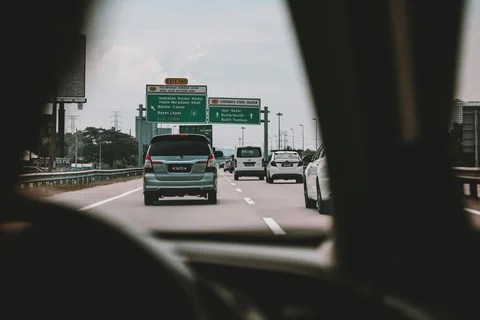 view of a Malaysian highway from inside the car