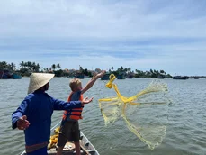 Child throwing net