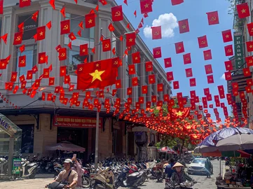 Vietnam flags on a street during Reunification day in March