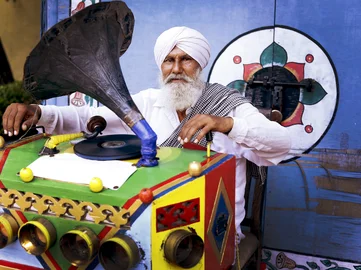 Man in India with record player