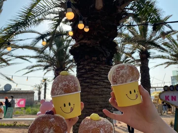 Fried doughnuts in Jeju South Korea on a things to do family trip 